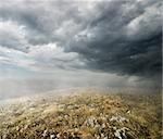 Clouds and fog over the autumn field