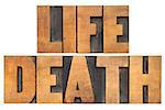 life and death  isolated words in vintage letterpress wood type