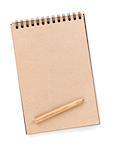 Brown paper notepad with pencil. Isolated on white background