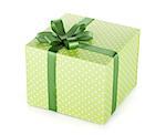 Green gift box with ribbon and bow. Isolated on white background