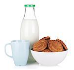 Cup, bottle of milk and bowl with cookies. Isolated on white background