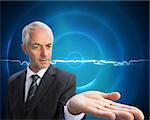 Composite image of concentrated businessman with palm up on black background with blue lightening