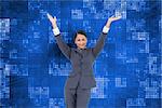 Composite image of cheering businesswoman on blue background