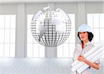 Composite image of confident woman holding construction plans