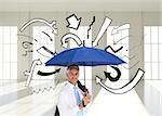 Composite image of mature businessman holding blue umbrella