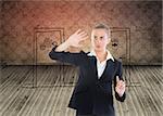 Composite image of blonde businesswoman pointing somewhere