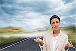 Composite image of confused businesswoman standing