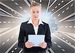 Composite image of blonde businesswoman holding tablet