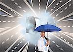 Composite image of businessman holding umbrella smiling at camera