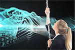 Composite image of blonde businesswoman pulling a chain