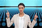 Composite image of serious businesswoman with hands up