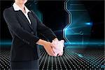 Composite image of blonde businesswoman holding piggy bank