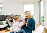 Family in Living Room at Home, Mannheim, Baden-Wurttemberg, Germany