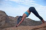 Woman doing yoga at Vazquez Rocks