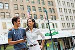 Couple chatting on street