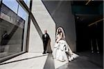 Portrait of Bride and Groom in lobby of building, Toronto, Ontario, Canada