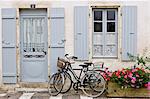 Traditional home with bicycles, Ile De Re, France.