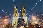 Christmas market and neo-gothic Church of St. Ludmila, Mir Square, Prague, Czech Republic, Europe