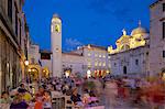 Clock tower and restaurants at dusk, Stradun, UNESCO World Heritage Site, Dubrovnik, Dalmatian Coast, Dalmatia, Croatia, Europe