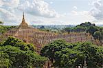 Thanboddhay Paya (pagoda) with rows of gilt mini-stupas on roof, near Monywa, Monywa Region, Myanmar (Burma), Asia