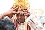 Close-up of Hindu Man getting reading for Wedding, Toronto, Ontario, Canada