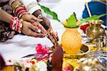 Close-up of Bride and Groom's Hands at Hindu Wedding Ceremony, Toronto, Ontario, Canada