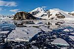 Snow-capped mountains in the Errera Channel on the western side of the Antarctic Peninsula, Antarctica, Southern Ocean, Polar Regions