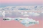 Sunset over icebergs in the Gerlache Strait, Antarctica, Southern Ocean, Polar Regions