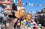 Couple in traditional costumes of Witch and Spattlehansel, Swabian Alemannic carnival, Gengenbach, Black Forest, Baden Wurttemberg, Germany, Europe