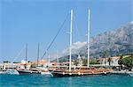 Sailing ship in the harbour of Makarska, Biokovo Mountain, Makarska Riviera, Dalmatia, Croatia, Europe