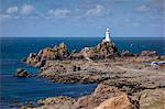 Corbiere Lighthouse and rocky coastline, Jersey, Channel Islands, United Kingdom, Europe