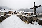 Snow covered town of St. Ursanne, Jura, Switzerland, Europe