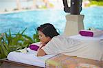 Woman relaxing on massage bed at Melati Beach Resort and Spa, Ko Samui, Thailand, Southeast Asia, Asia