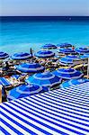 Beach parasols, Nice, Alpes Maritimes, Provence, Cote d'Azur, French Riviera, France, Europe