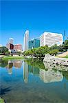 City park lagoon with downtown Omaha, Nebraska, United States of America, North America