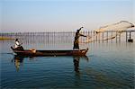 Fisherman on Taung Thama Lake and U Bein bridge at Amarapura, Mandalay Province, Myanmar (Burma), Asia