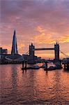 The Shard and Tower Bridge on the River Thames at sunset, London, England, United Kingdom, Europe