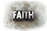 The word "FAITH" written in old vintage letterpress type.