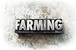 The word "FARMING" written in old vintage letterpress type.