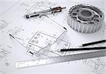 Glasses, ruler, compass, pencil and gear lie on the drawing. 3d render