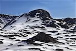 Rocks in snow. Turkey, Central Taurus Mountains, Aladaglar (Anti-Taurus), plateau Edigel (Yedi Goller)