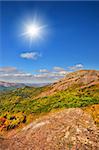 top of the mountain on the background of the cloudy sky. natural composition