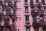 The typical old houses with fire stairs in New York in USA