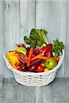 Photo of white basket with vegetables