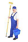 House painter in blue dungarees over white background