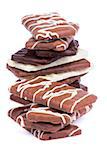 Stack of Chocolate Biscuits with Dark, Milk and White Chocolate Glazed isolated on white background