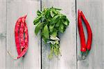 Photo of green  basil, haricot and cayenne pepper