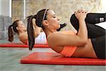 beautiful young women working out in the fitness studio