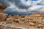 Above the rooftops before storm in Noto in Sicily