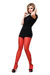 Beautiful young woman in a black dress and red tights